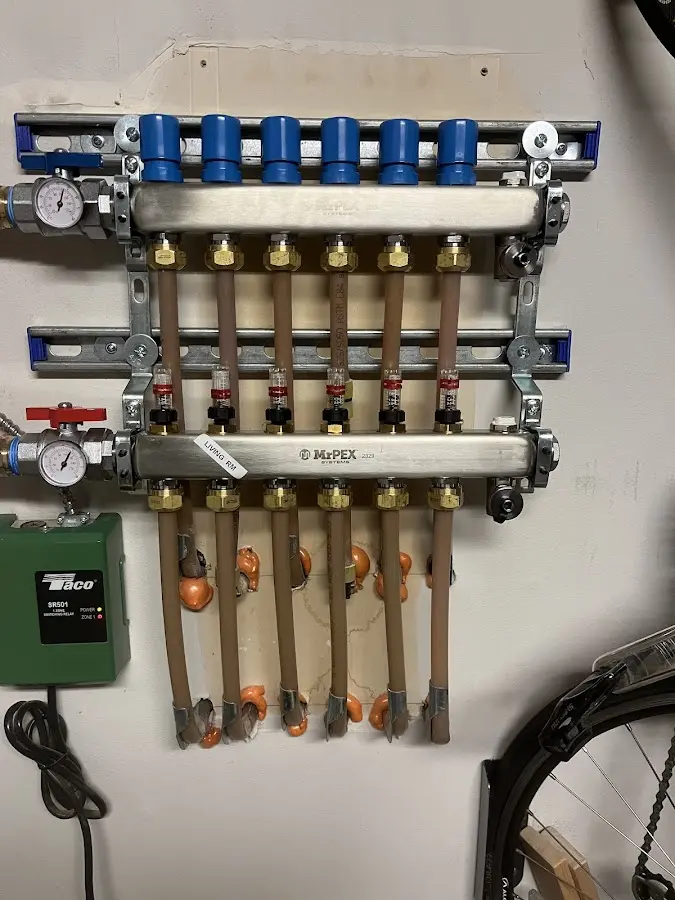 Plumber performing Water Heater Repair at a residential property in Vandalia